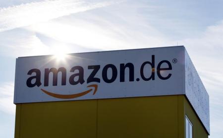 The sun reflects off Amazon's logistics centre in Graben