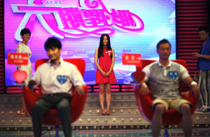A participant introduces herself during the recording of an episode of "Meet you on Saturday", a matchmaking TV programme, in Shanghai