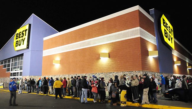 Black Friday shoppers wait in line in 30 degree temperatures